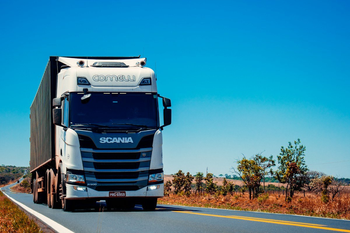 Heavy logistics container truck and terminal crane intermodal handover
